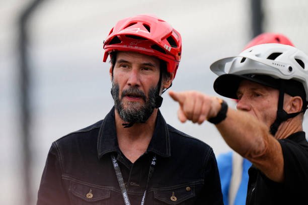 Keanu Reeves, known for his roles in Speed and The Matrix, veers off course during his professional racing debut in Indianapolis.