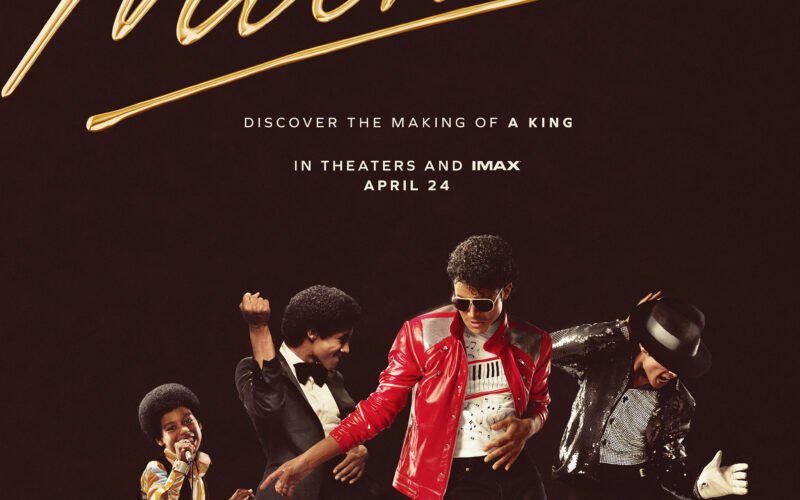 Official movie poster for the 2026 Michael biopic featuring Jaafar Jackson in a golden-hued recreation of the iconic Beat It red leather jacket.